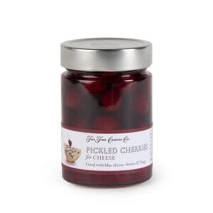 Jar of pickled cherries by The Fine Cheese Co.