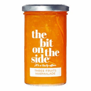 Jar of three fruits marmalade labeled 'The Bit on the Side.'
