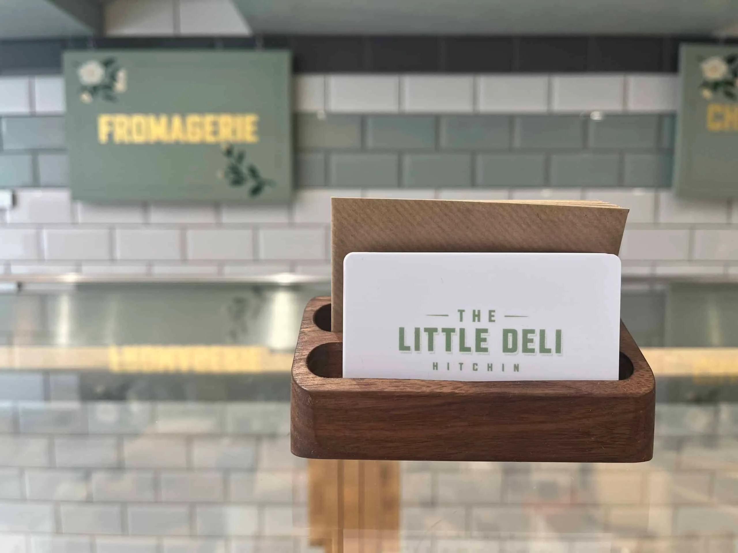 Hitchin Deli Gift Card, shot artfully on the counter of the deli.