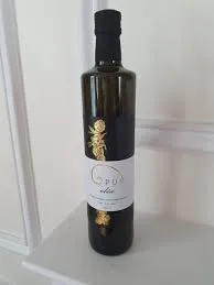 Bottle of Opus wine on white shelf