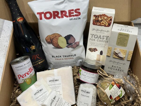 Assorted gourmet food items in a gift box