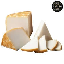 Sliced cheese wedges on white background
