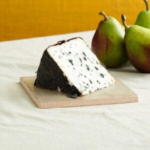 Blue cheese with pears on table