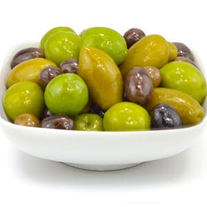 Assorted olives in white bowl isolated on white