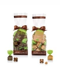 Assorted chocolate gift packs with elegant bows