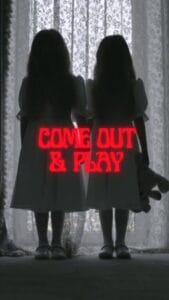 Two silhouetted girls before lace curtains, with ‘Come Out & Play’ text.
